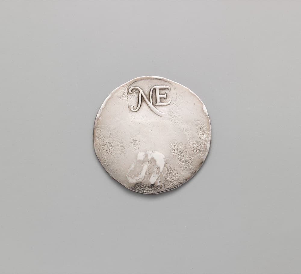 1652 New England (NE) shilling obverse with the NE punch — the Metropolitan Museum of Art's example of the same issue; the tracked Noe-1 specimen is a different coin