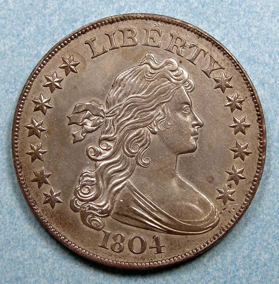 Obverse of the United States Mint specimen of the 1804 Draped Bust dollar, Class I, in the Smithsonian's National Numismatic Collection. The FLOAT constituent is priced at the Class I diplomatic-presentation level; the pictured coin is the Mint's own Class I example.