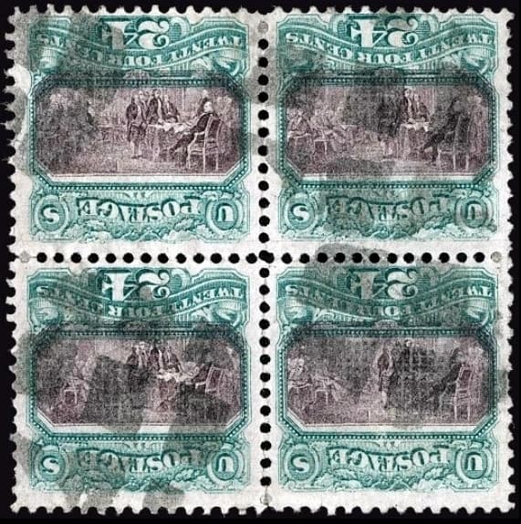 A used block of four of the 1869 24c green & violet 'Declaration of Independence' with inverted center (Scott 120b) - examples of the error; the constituent counts ~4 known unused singles.